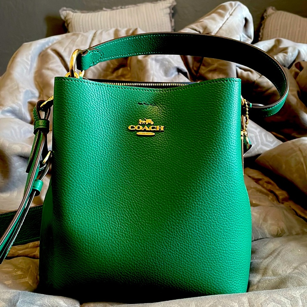 Green coach bucket purse Bnwt